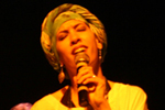 'A Benzedeira' - personagem que fez parte do Show Samba-Fuso entre 2007 e 2008, representando o sincretismo religioso que marca a cultura brasileira